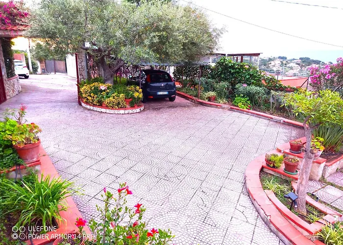 Maison d'hôtes Stanza Con Bagno E Cucina In Comune In Giardino